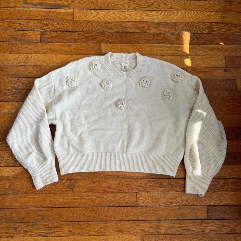 Cozy White Sweater with Floral Accents